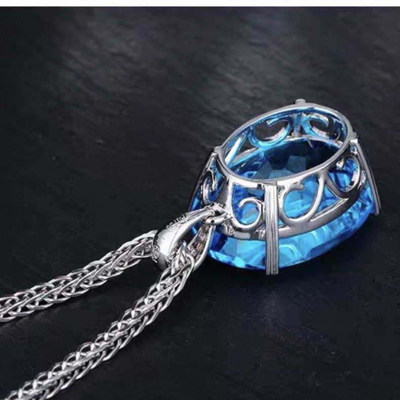 Aquamarine Blue Oval Pendant Necklace — Swiss-Cut Topaz Halo - Image 4